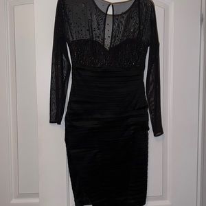 Worn once. Form fitting dress. Perfect for New Years